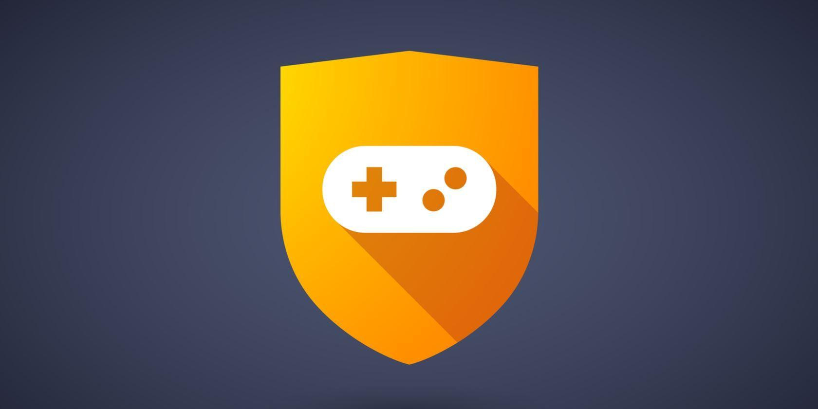 Video game controller on gold shield icon